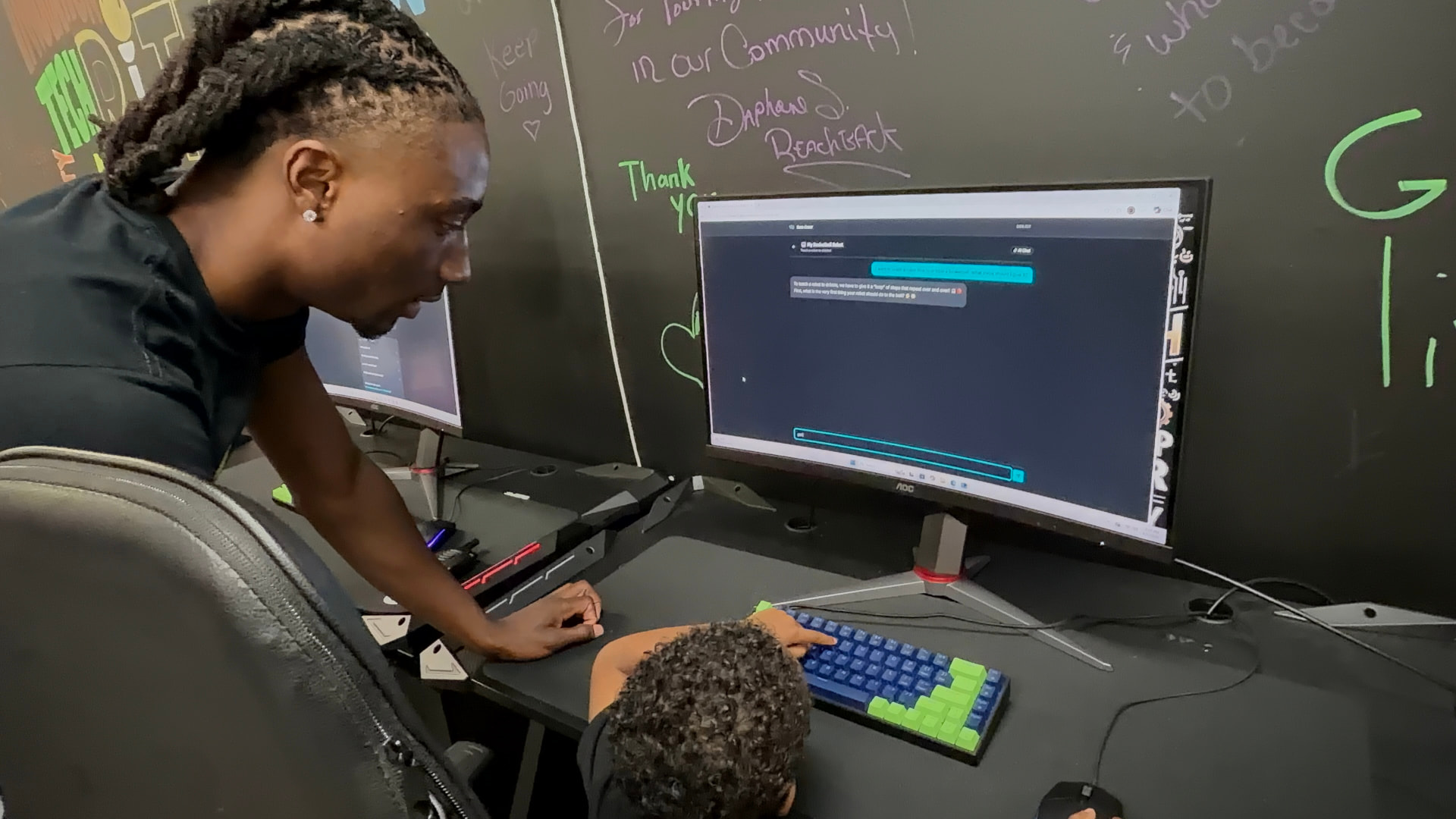 Mentor guiding a young student building an AI chatbot