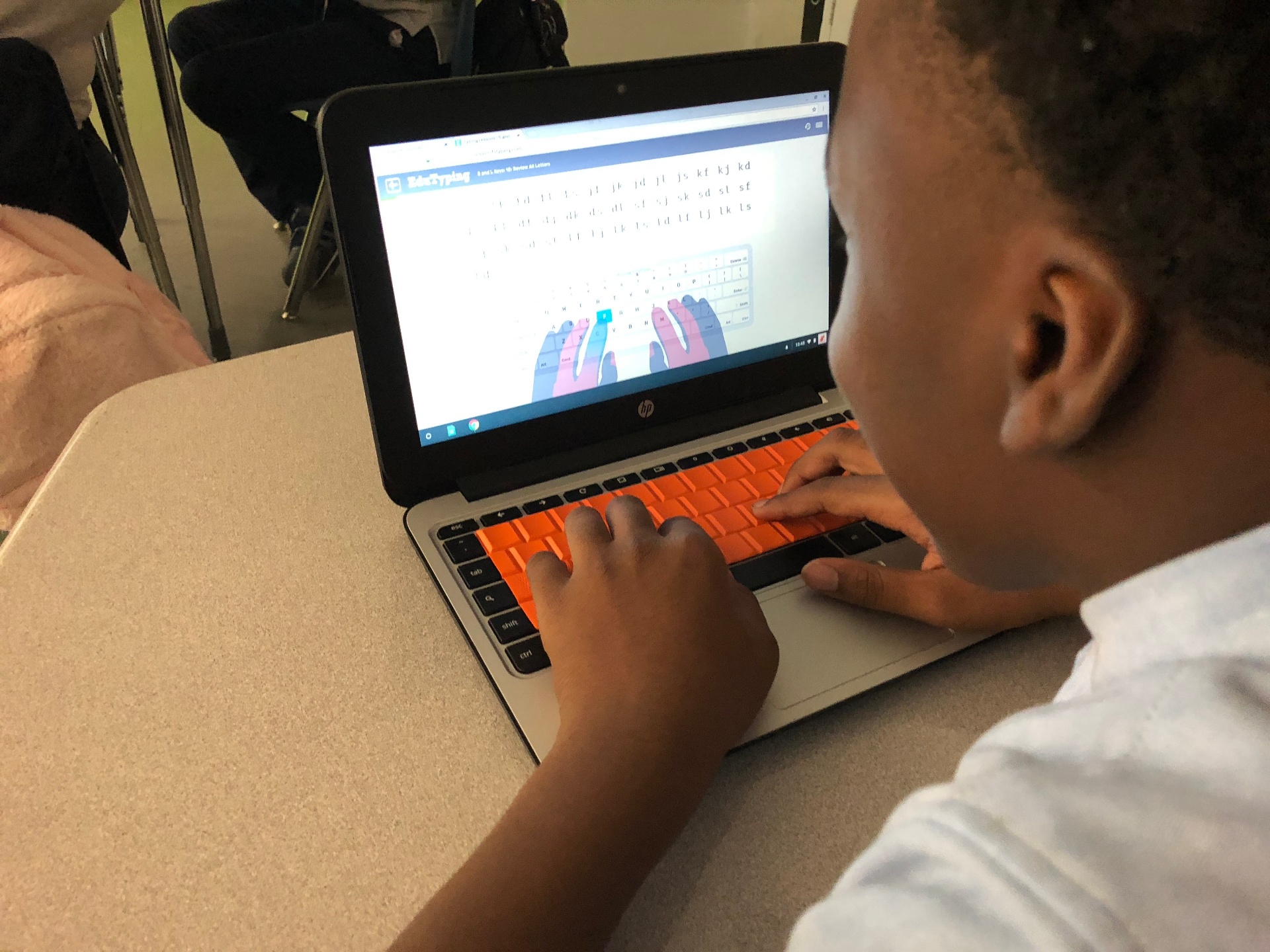 Student learning coding on laptop